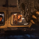 (from left) Kayla Watts (DeWanda Wise), Dr. Ellie Sattler (Laura Dern) and a Giganotosaurus in Jurassic World Dominion.